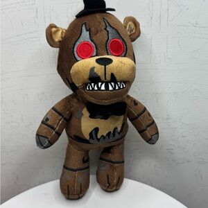 Brown and Black Plush Bear Toy